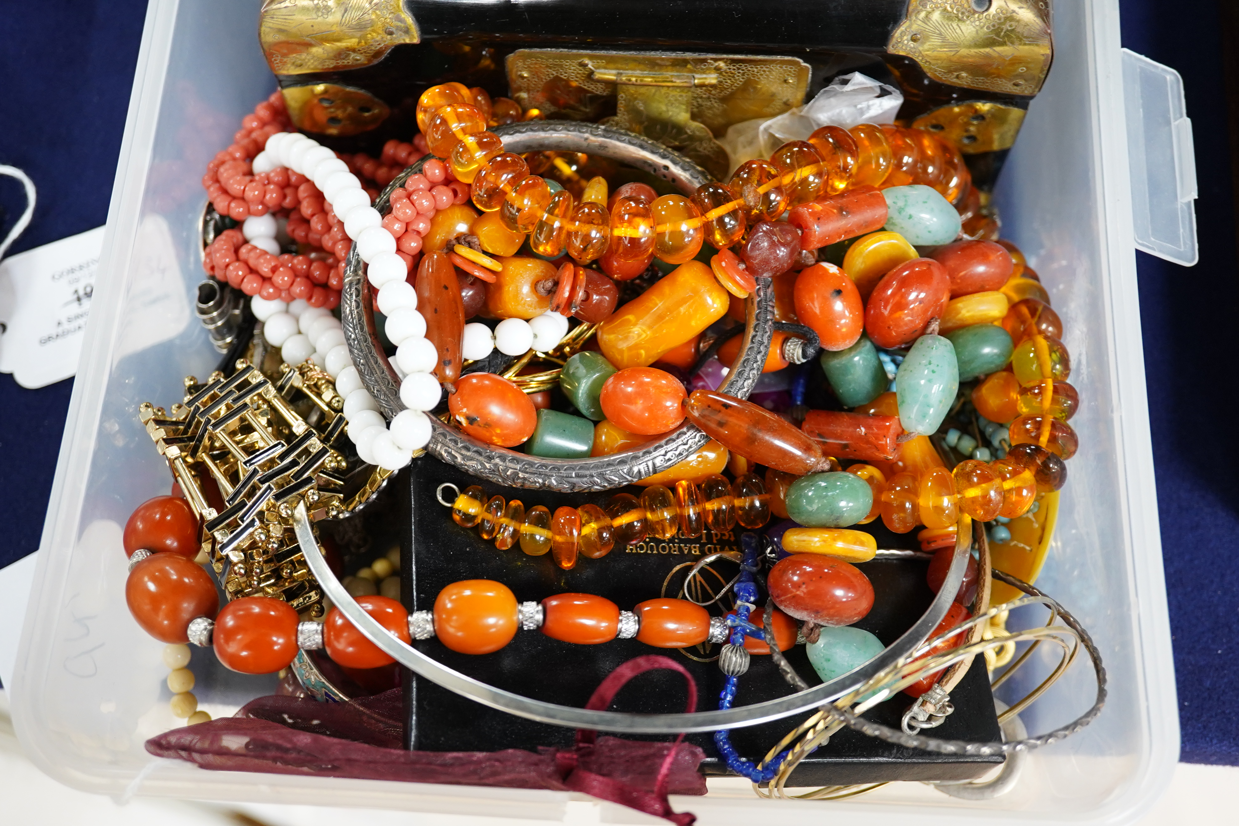 A quantity of assorted jewellery and other items including costume, amber necklace, silver ring, 925 cross pendant, lacquer box, etc. Condition - fair